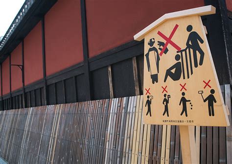 A Sign In Kyoto Historic District Of Gion Asking Tourists To Refrain