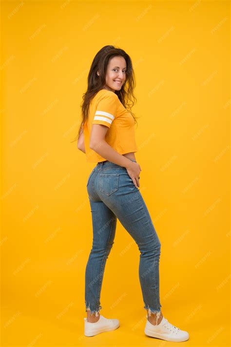 Premium Photo Skinny Jeans Suits Her Self Confidence Is Best Outfit Sexy Girl Yellow