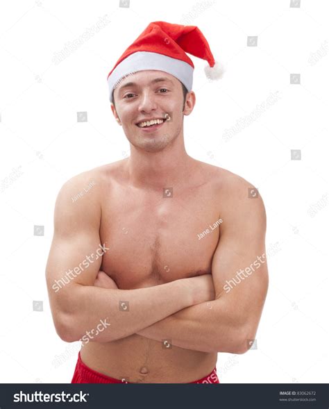 Sexy Naked Muscular Man Wearing A Santa Claus Hat Stock Photo