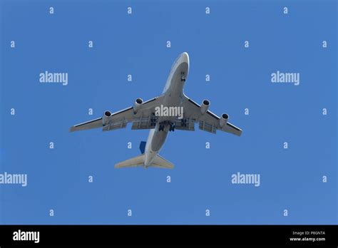 Bottom View Of A Passenger Aircraft With The Landing Gear Down Stock