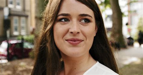 Slow Motion Portrait Of Beautiful Happy Smiling Woman In The City By