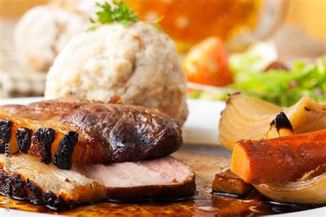 Bayerischer Schweinebraten Mit Semmelkn Del Stock Photo Adobe Stock