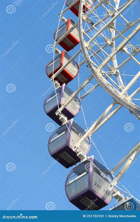 Closeup Of Multicolored Tempozan Ferris Wheel In Amusement Park With