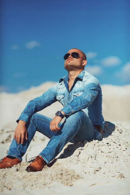 Premium Photo Man Relaxing On Beach