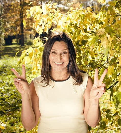 Mature Brunette Woman In Park Stock Image Image Of Happy Green