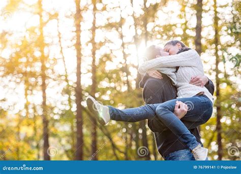 Couple In Love Man Carrying Woman In His Arms Stock Image Image Of