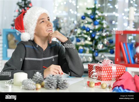 Teen boy writing letter hi-res stock photography and images - Alamy