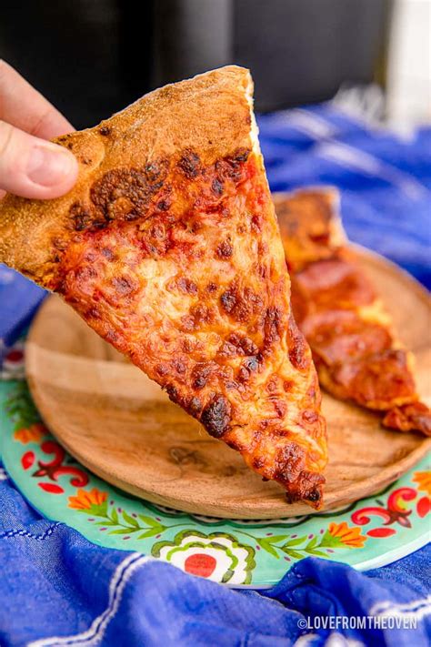 How To Reheat Pizza In An Air Fryer Love From The Oven