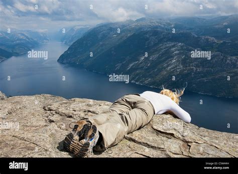 Hikers Standing Edge Pulpit Rock Cliff Lysefjorden Fjord Hi Res Stock