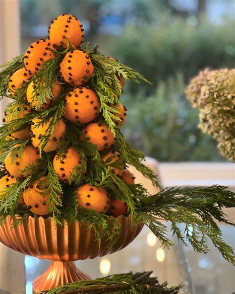 A Williamsburg Style Orange And Clove Pomander Topiary Filled With