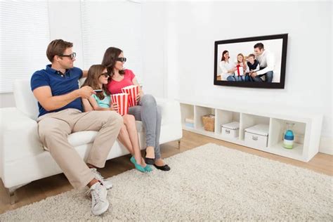 Family Watching TV — Stock Photo © AndreyPopov #51171067