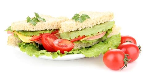 Premium Photo Fresh And Tasty Sandwiches On Plate Isolated On White