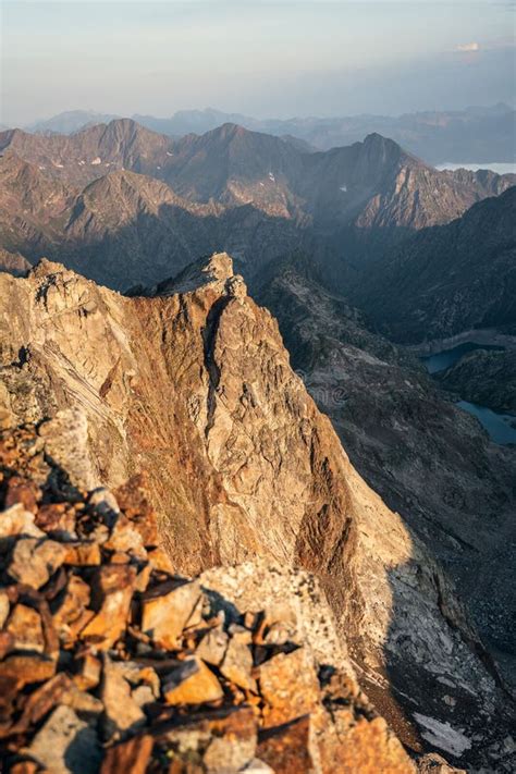 Vertical Of A Rugged Rocky Mountain Captured On A Sunny Day Stock