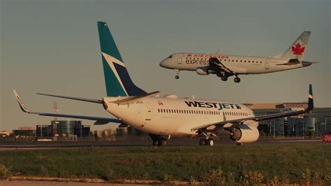 Westjet Boeing 737 7ct C Gwjg Air Canada Express Embraer Erj 175 C