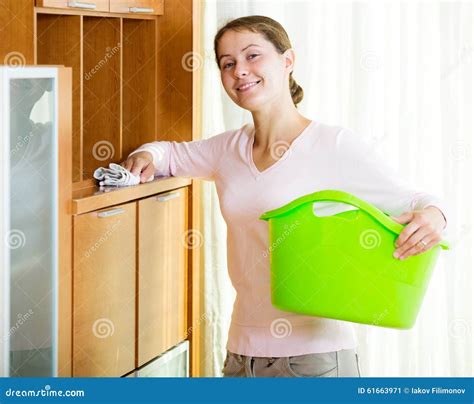 Brunette Girl Dusting Furniture At Home Stock Image Image Of Portrait