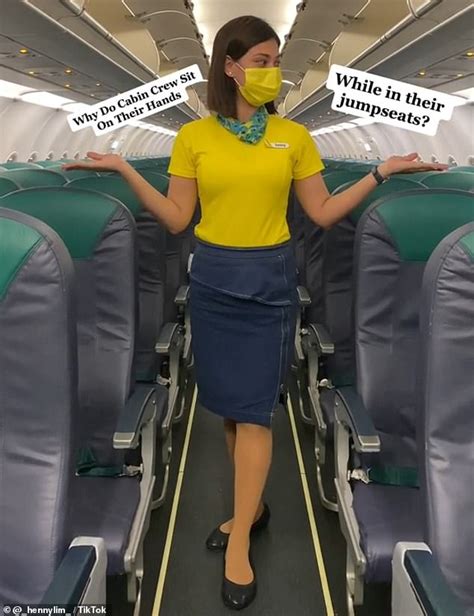 Flight Attendant Reveals Fascinating Reason Why Cabin Crew Sit On Their