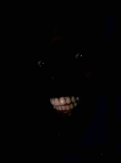 Black Man Smiling In The Dark