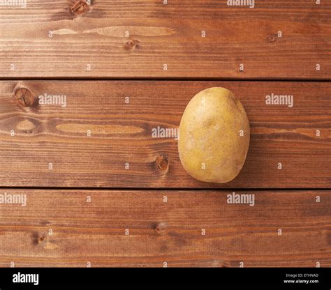 Single Brown Potato Composition Stock Photo Alamy