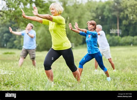 Seniors In The Wellness Class Do Qi Gong Or Tai Chi Exercise For