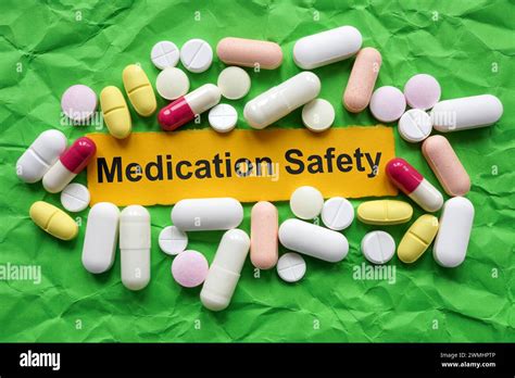 Medication Safety Concept Tablets On Crumpled Paper Stock Photo Alamy