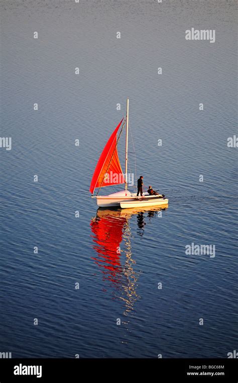 Sailboat Red Sail On The Baltic Sea Biosphaerenreservat Suedost