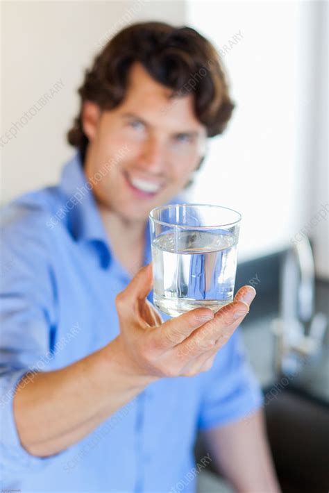 Man Drinking Glass Of Water Stock Image C Science Photo