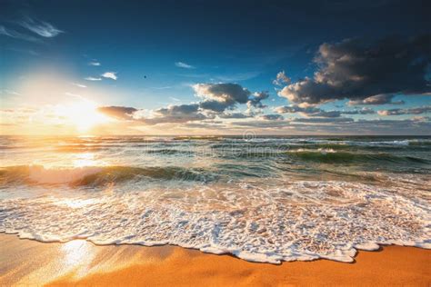 Colorful Ocean Beach Sunrise With Deep Blue Sky Stock Image Image Of