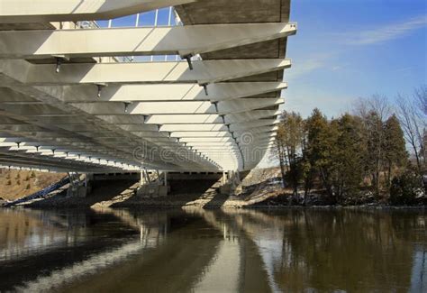 Under Vimy Memorial Bridge With Reflection On Rideau River In Ottawa