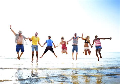 Friends playing water beach | Premium Photo - rawpixel