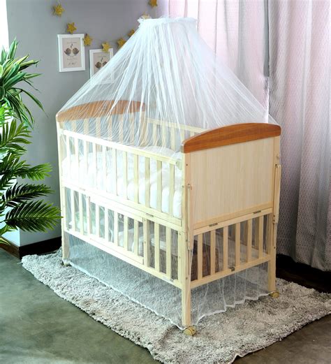 Buy Baby Wooden Cot With Cradle Swing And Mosquito Net In Cream By Mee