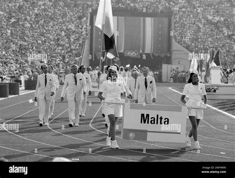 Members Of The Malta Olympic Team March In The Parade Of The Athletes