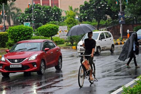 Rain Brings Relief From Scorching Heat In Delhi Min Temp Dips