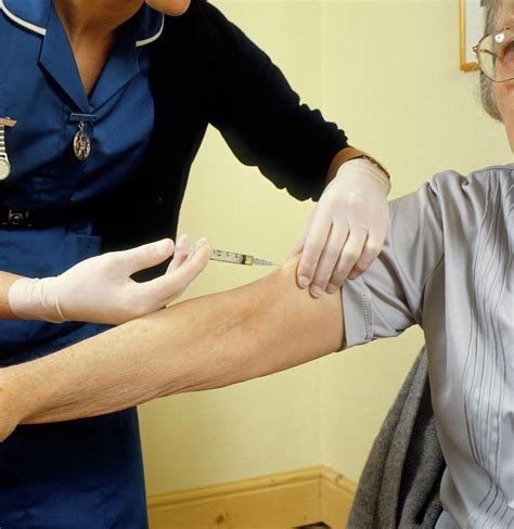 Elderly Woman Given Injection By District Nurse Photograph By Chris Priest Science Photo Library