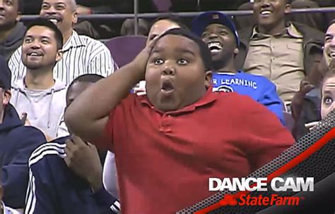 Epic Dance Battle Between an Excited Kid and a Detroit Pistons Usher During a Basketball Game