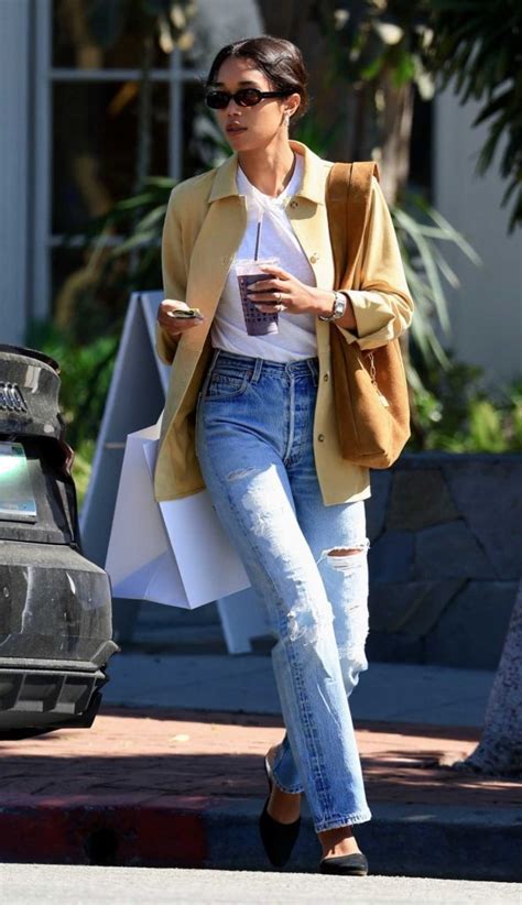 Laura Harrier In A Blue Ripped Jeans Was Seen Out In Los Angeles