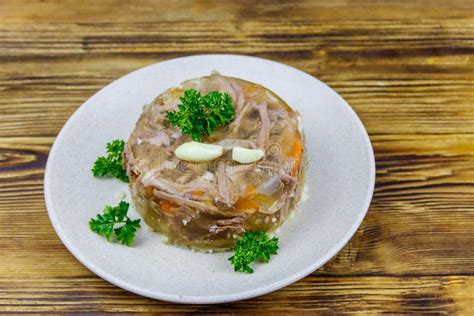 Meat Aspic In A Plate On Wooden Table Traditional Russian Dish Stock