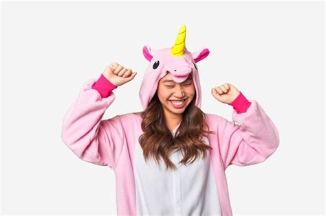 Premium Photo | A woman wearing a unicorn costume and wearing a unicorn ...