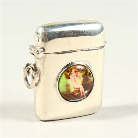 A SILVER AND ENAMEL NUDE VESTA