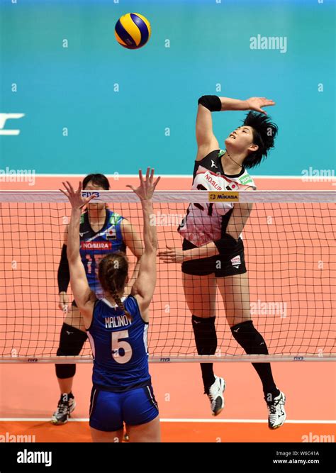 Ai Kurogo Top Of Japan Spikes Against Ofelia Malinov Of Italy In Their Third Round Match