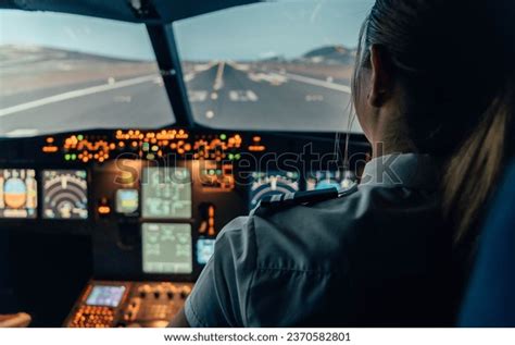 Unrecognizable Female Pilot On Cockpit Aircraft Stock Photo 2370582801 | Shutterstock