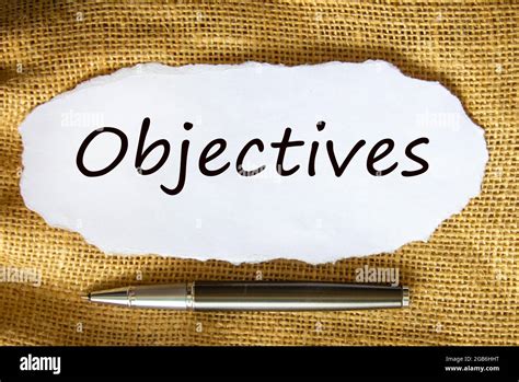 Objectives Symbol The Concept Word Objectives On White Paper Black