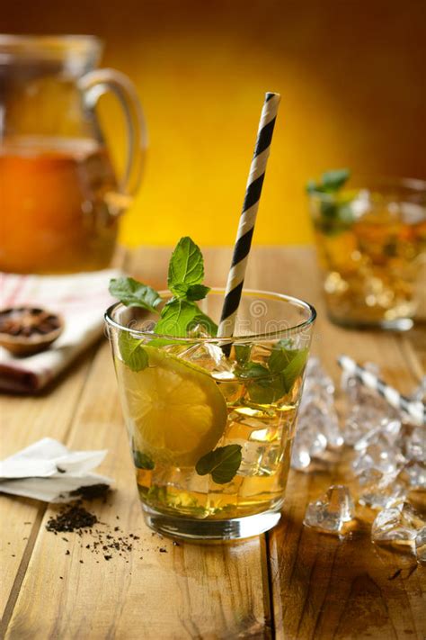 Cold Tea With Lemon And Mint Leaves Stock Image Image Of Beverage