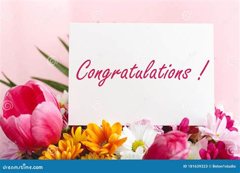 Congratulations Text on Gift Card in Flowers Bouquet on Pink Background ...