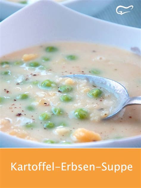 A White Bowl Filled With Soup And Peas