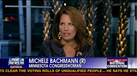 Ladies in Satin Blouses: Michele Bachmann - black satin suit