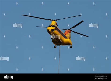 A Boeing Ch 46e Sea Knight Helicopter Configured For Firefighting