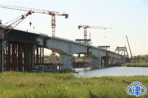 京滨铁路全线最大跨度连续梁—跨永定新河连续梁合龙 封面新闻