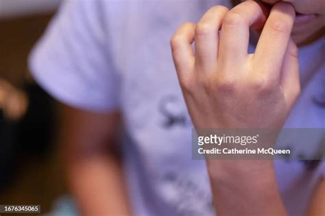 Girl Biting Nails Photos And Premium High Res Pictures Getty Images