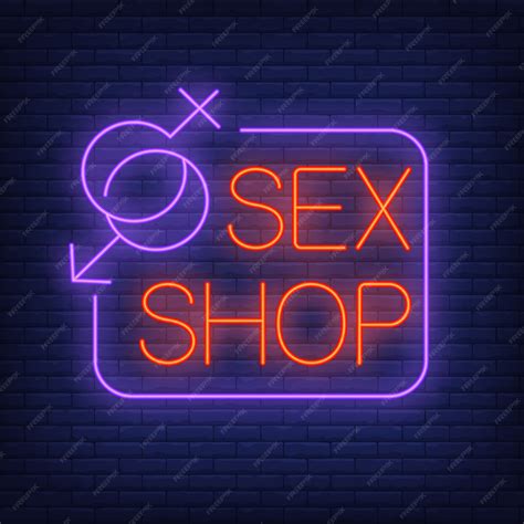 Sex Shop Letrero De Neón Símbolos De Género Con Marco En La Pared De Ladrillo Vector Premium