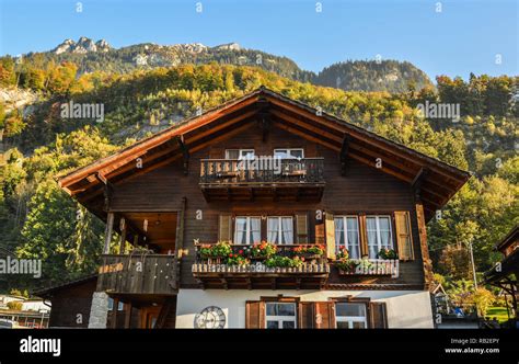 Traditional Swiss Alps Rural Wood House In Village Of Alpine